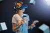 young woman using VR console gaming set