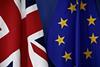 EU and UK flags in Brussels credit shutterstockcom