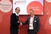 (L)Frédéric Brochard, CTO of France Télévisions, and Trevor Spielmann, head of sales – newsroom solutions for Scisys, celebrate the newsroom systems deal at IBC2019