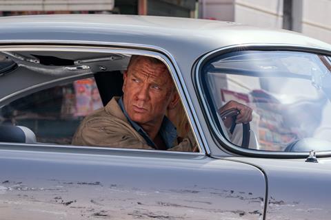 James Bond (Daniel Craig) and Dr. Madeleine Swann (Léa Seydoux) drive through Matera, Italy in NO TIME TO DIE, a DANJAQ and Metro Goldwyn Mayer Pictures film. Credit: Nicola Dove © 2019 DANJAQ, LLC AND MGM. ALL RIGHTS RESERVED.