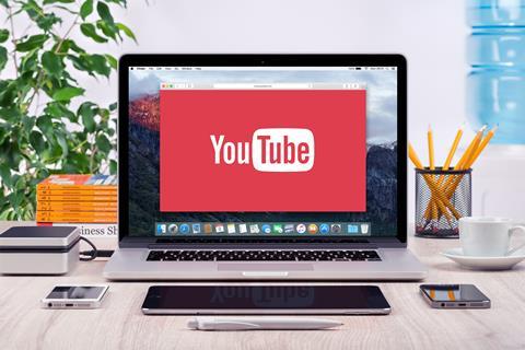 Youtube on laptop screen device (Alexey Boldin Shutterstock)
