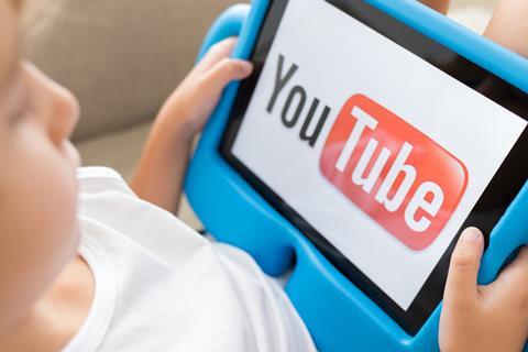 YouTube Kids - child watching on tablet creditThais Ceneviva shutterstock