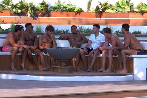 The boys around the fire pit: Love Island series 4