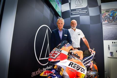 Robert Morgan-Males and Rodrigo Thomaz of Audio-Technica Europe with the Honda Repsol bike of Marc Marquez, who’s currently leading the Moto GP series