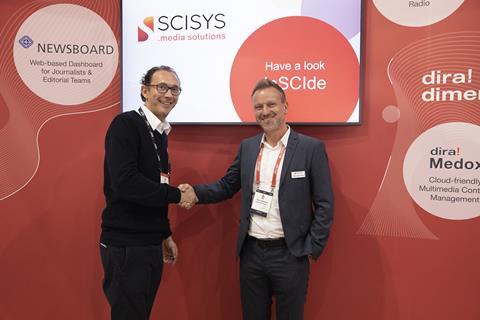 (L)Frédéric Brochard, CTO of France Télévisions, and Trevor Spielmann, head of sales – newsroom solutions for Scisys, celebrate the newsroom systems deal at IBC2019