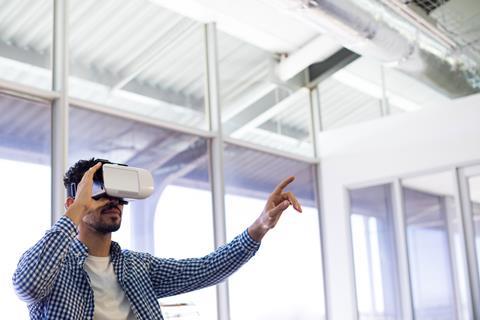 man using virtual reality headset immersive