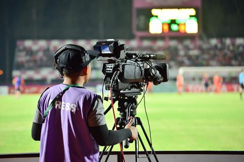 Football game camera crew