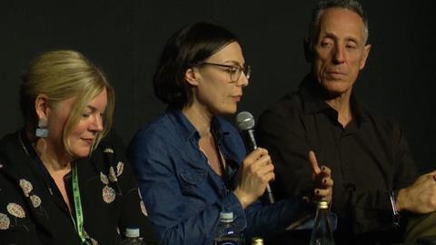 Catherine Goldschmidt (speaking, with mic) and Salvatore Totino talking about AI's impact on cinematography